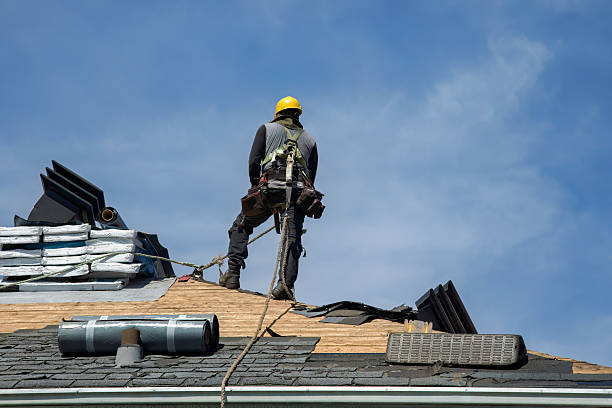 Professional Storm Damage Roof Repair technician working in Liberty, PA